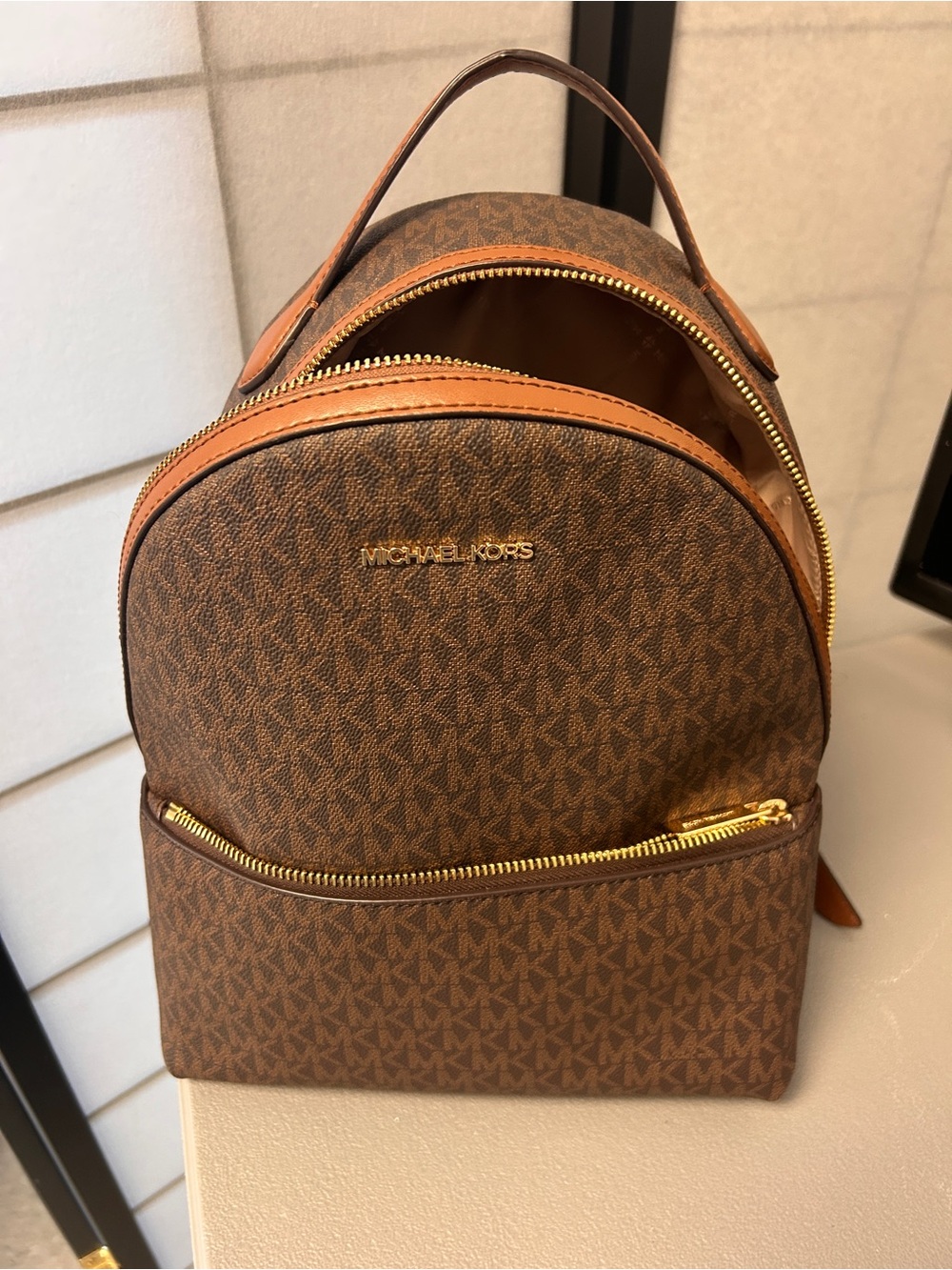 Michael Kors Brown MK Signature Mini Backpack with Gold Hardware